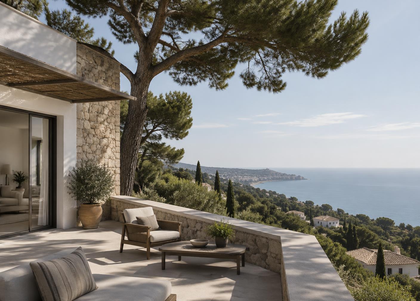 A residential terrace above the Mediterranean, framed by a pine